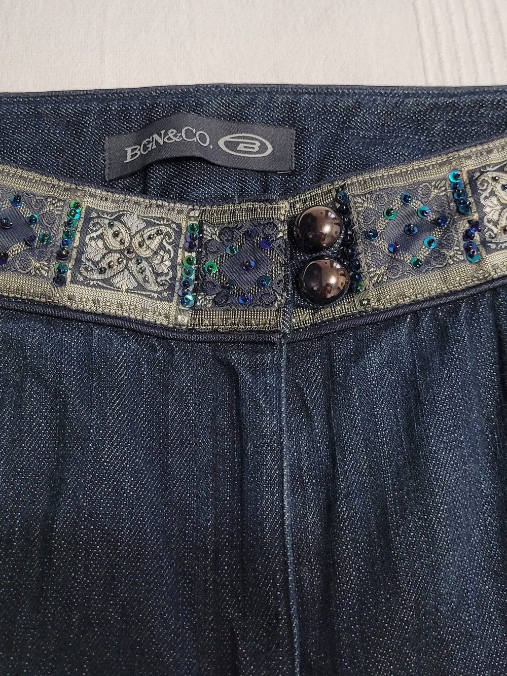 High-Rise Wide-Leg Jeans in Dark Blue - Embellished Waistband